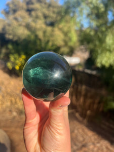 Blue Green Rainbow Filled Fluorite Sphere