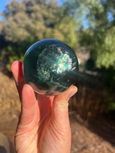 Load image into Gallery viewer, Blue Green Rainbow Filled Fluorite Sphere